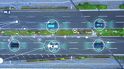 Autonomous vehicles emitting LiDAR signals.