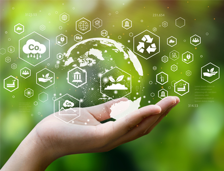 Hand holding various sustainability related icons
