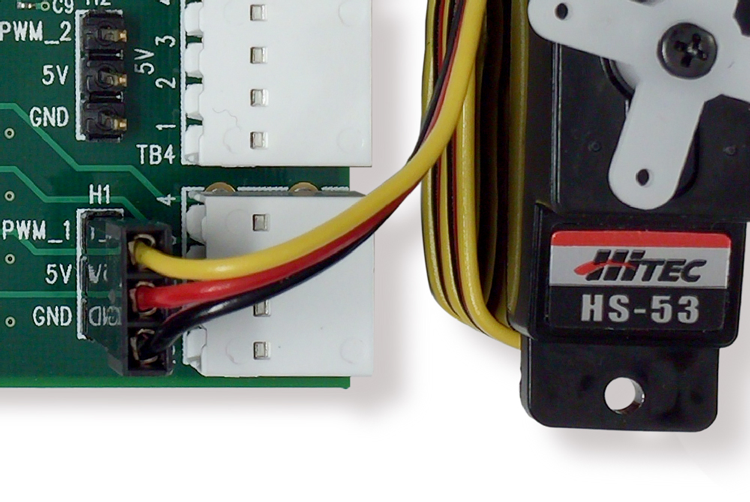 Figure 2. HiTec HS-53 servo motor connected to the standard 3-pin header on the MAXREFDES37 reference design
