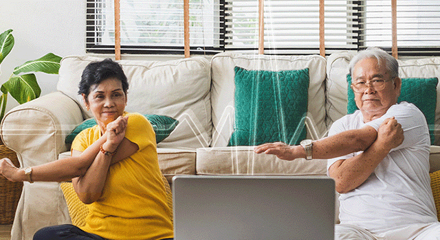 an older couple tracking their heart health while being active