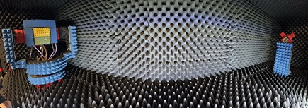 Figure 2c. Anechoic chamber inside view. The antenna array is mounted to GIM04 gimbal on the left. The X-band horn antenna is mounted in the far-field on the right.