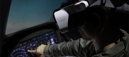 a man conducting a virtual flying simulation by using the varjo headsets